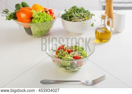 The Healthy Vegetarian Salad On White Table