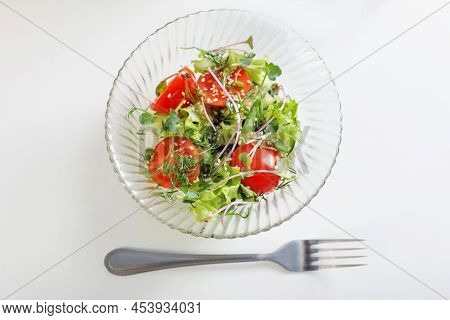 The Healthy Vegetarian Salad On White Table