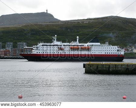 Ro-ro - Passenger Ship Arriving At Hammerfest On Overcast Day.