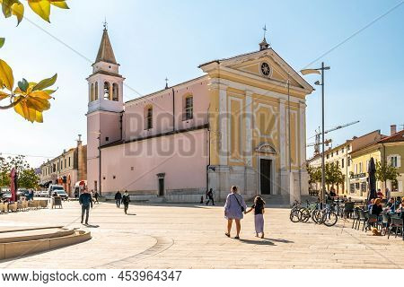Porec,croatia - April 25,2022 - Church At The Market Place In Porec. Porec Is A Town And Municipalit