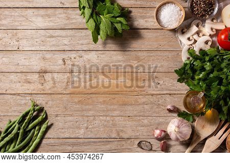 Assortment Of Vegetables, Herbs And Spices On Wooden Table. Top View. Copy Space