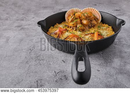 Peruvian Food: Rice With Seafood. Arroz Con Mariscos, Food Served In Pan, Selective Focus.