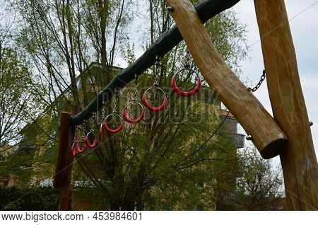 Outdoor Sports Ground For Children And Adults. Handcuffing, Climbing Rope. Parallel Bars And Pull-ou