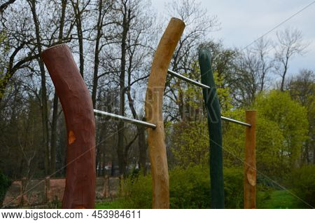 Outdoor Sports Ground For Children And Adults. Handcuffing, Climbing Rope. Parallel Bars And Pull-ou