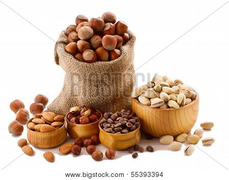 Hazelnuts, filbert on old wooden background
