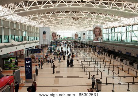BUENOS AIRES, ARGENTINA - MAR 21 2014 : Passengers await checkin at Departures.
