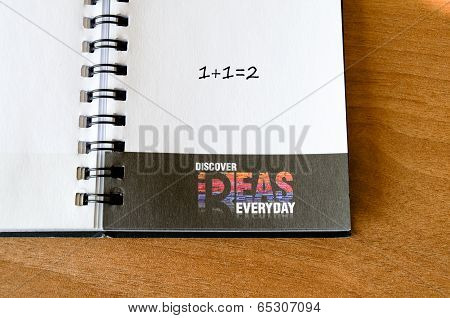 Blank Notepad On Office Wooden Table