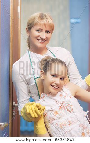 Family Doing Cleaning Together