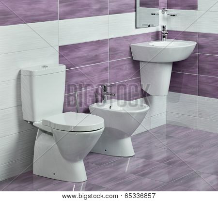 Detail Of Modern Bathroom With Sink, Toilet And Bidet