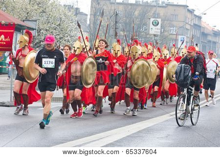 Krakow, Poland - April 28 : Cracovia Marathon. Spartans Children Charity Group Speed On The City Str
