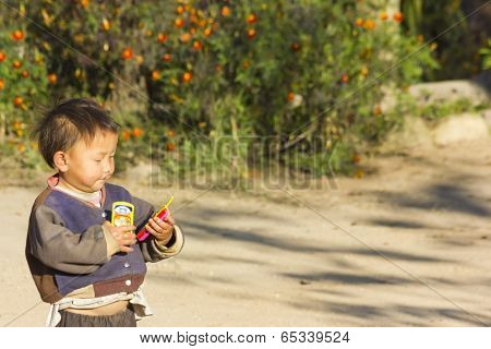 Children Warm Oneself In The Winter Season.