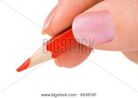 Crayon rouge à la main