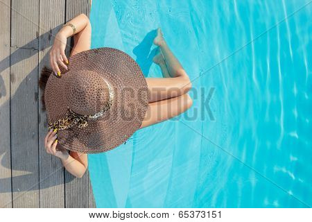 Top view of a  girl in the swimming pool