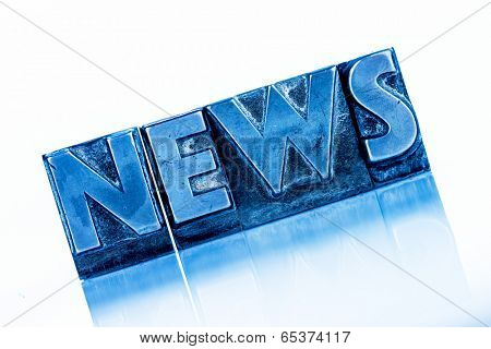 the word news written with lead letters. symbolic photo for newsletters, newspapers and information
