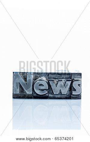 the word news written with lead letters. symbolic photo for newsletters, newspapers and information