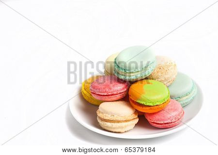 Colorful fresh makarons Cake on a plate