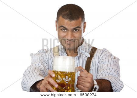 Uomo attraente sexy con Lederhose tiene l'Oktoberfest Beer Stein