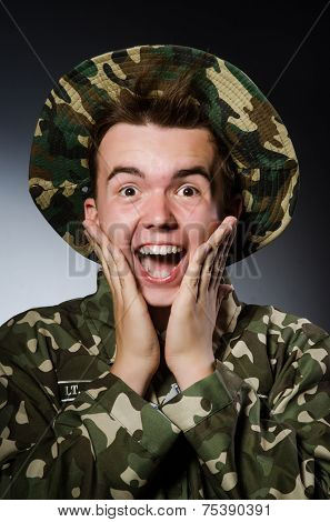 Funny soldier in military concept
