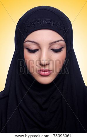 Muslim young woman wearing hijab on white