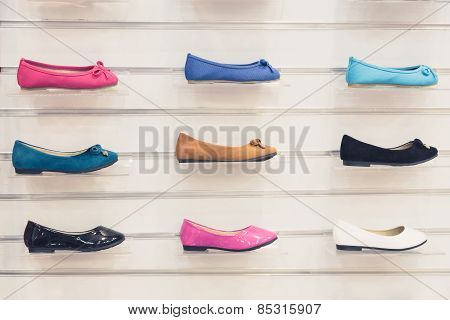Set of multicolor textile flat shoes