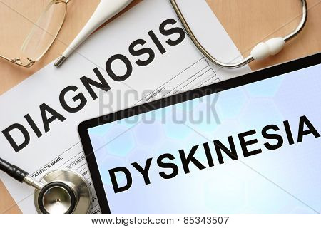 Tablet with diagnosis dyskinesia and stethoscope.