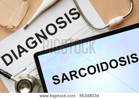 Tablet with diagnosis sarcoidosis and stethoscope.