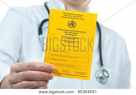 Doctor showing an international certificate of the vaccination