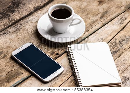 Mock Up Set Of Smartphone, Notebook And Cup Of Coffee.
