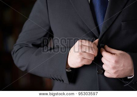 Fragment of a man in a business suit