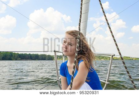 Relaxing Caucasian Woman Travelling On Yacht And Smiling.