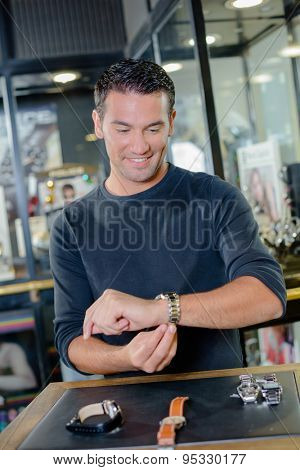 Man shopping for a watch