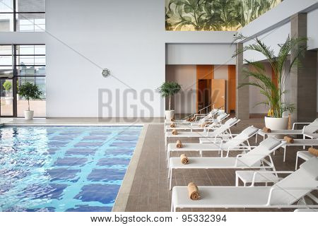 SOCHI, RUSSIA - JUL 27, 2014: Interior space with an indoor pool and loungers in the Hotel Radisson Blu Paradise Resort and Spa