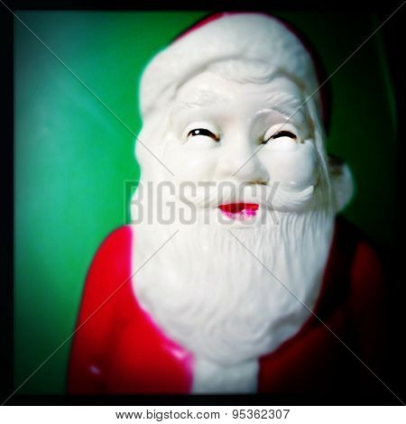 Instagram filtered image of vintage plastic Santa Claus