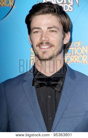 BURBANK - JUNE 25: Grant Gustin arrives at the 41st Annual Saturn Awards on Thursday, June 25, 2015 at the Castaway Restaurant in Burbank, CA.