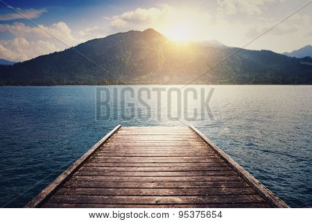 beautiful landscape with lake, moorage and hills