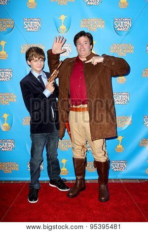 BURBANK - JUNE 25: Ty Simpkins, with cosplayer Brian Sikoff, arrives at the 41st Annual Saturn Awards on Thursday, June 25, 2015 at the Castaway Restaurant in Burbank, CA.