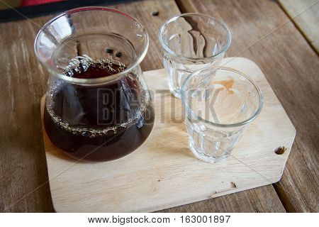 Classic Coffee pamaricano Delicious Coffee Drink wood background
