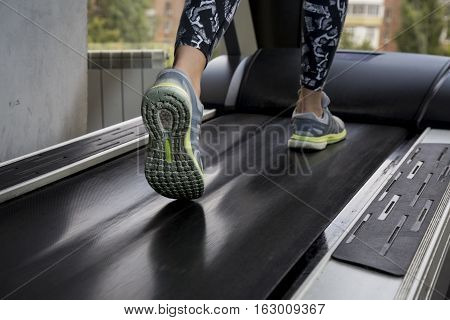 Young Woman Goes In For Sports At Gym