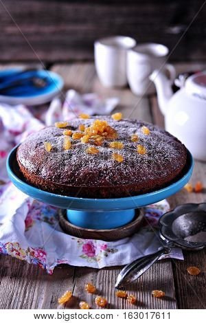 Lenten honey cake without eggs with raisins and nuts. Rustic style.