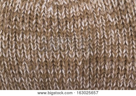 Light Beige knitted fabric knitted as background