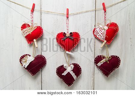 Beautiful Festive Heart Weigh On Cord On Wooden Background