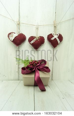 Beautiful Festive Heart Weigh On Cord On Wooden Background