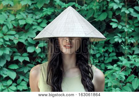 Portrait Of A Girl In A Straw Hat