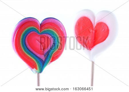 Valentine's Day heart-shaped lollipops on a white background