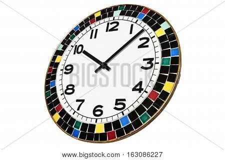 A round clock surrounded by ceramic pieces from Morocco. view in perspective.