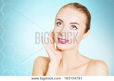 renovating skin concpet. woman face portrait with lifting marks