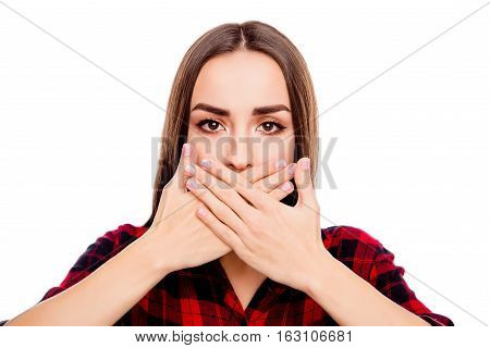 Calm Woman Making Tabu Gesture And Covering Mouth With Hands