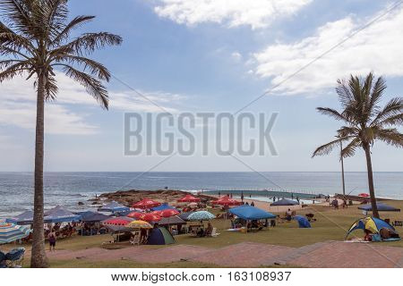 People On Early Morning Beach At Scottburgh In  South Africa