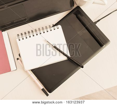 notebook for notes lying on the office desk
