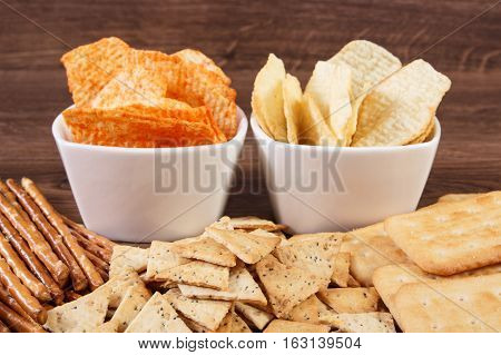 Heap Of Salted Crisps, Breadsticks And Cookies, Concept Of Unhealthy Food